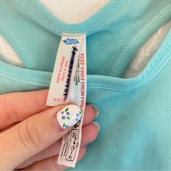 Free people movement with cute back cutout Aqua Tank Top for Women - Picture 2 of 3